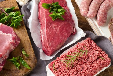 Different,Types,Of,Fresh,Raw,Meat,On,Dark,Wooden,Background.
