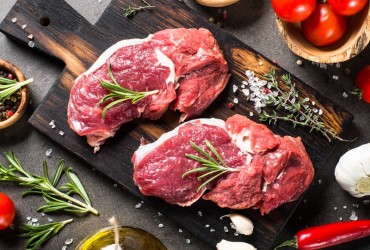 Raw,Meat.,Raw,Beef,Steak,On,A,Cutting,Board,With